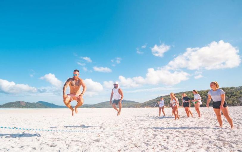 A backpacker swimming in The White sundays Australia