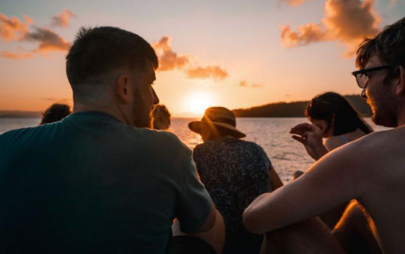 A backpacker swimming in The White sundays Australia