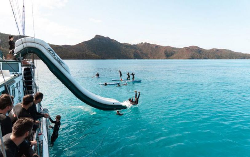 A backpacker swimming in The White sundays Australia