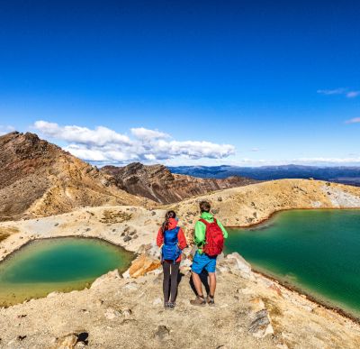 Backpackers hiking Tongariro National Park is on New Zealand's North Island