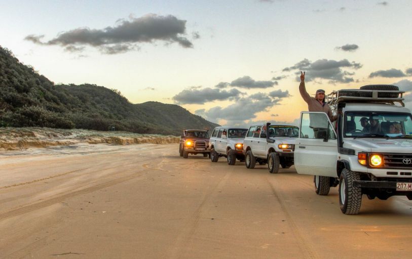 A caravan of 4wd cars exploring K'gari (Fraser Island)
