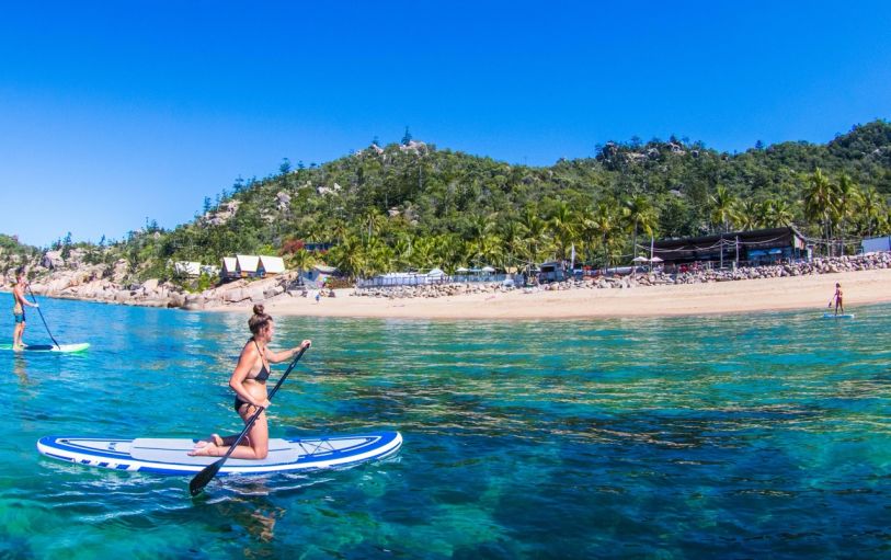 Backpackers on the East Coast in Bounce Noosa hostel enjoying the pool