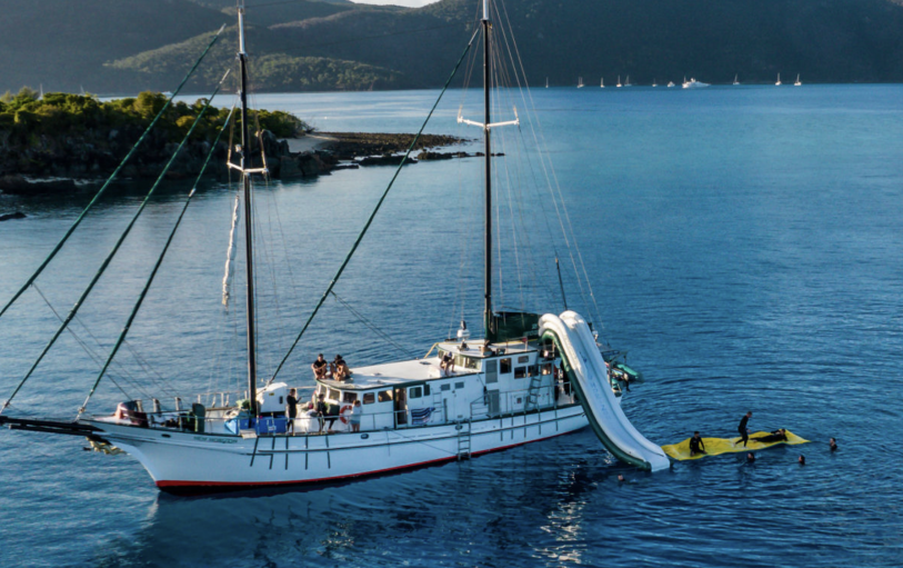 A backpacker swimming in The White sundays Australia