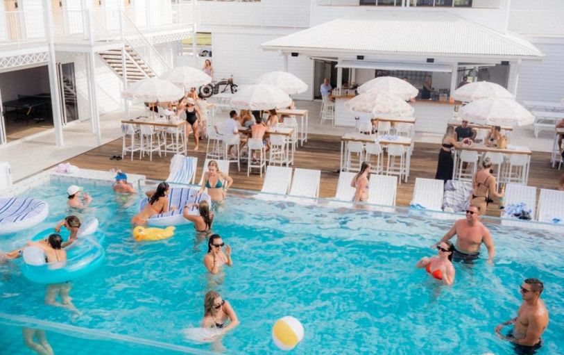 Backpackers on the East Coast in Bounce Noosa hostel enjoying the pool
