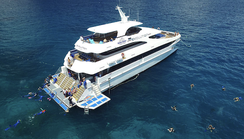 The Evolution dive superyacht moored at the Great Barrier Reef in Cairns