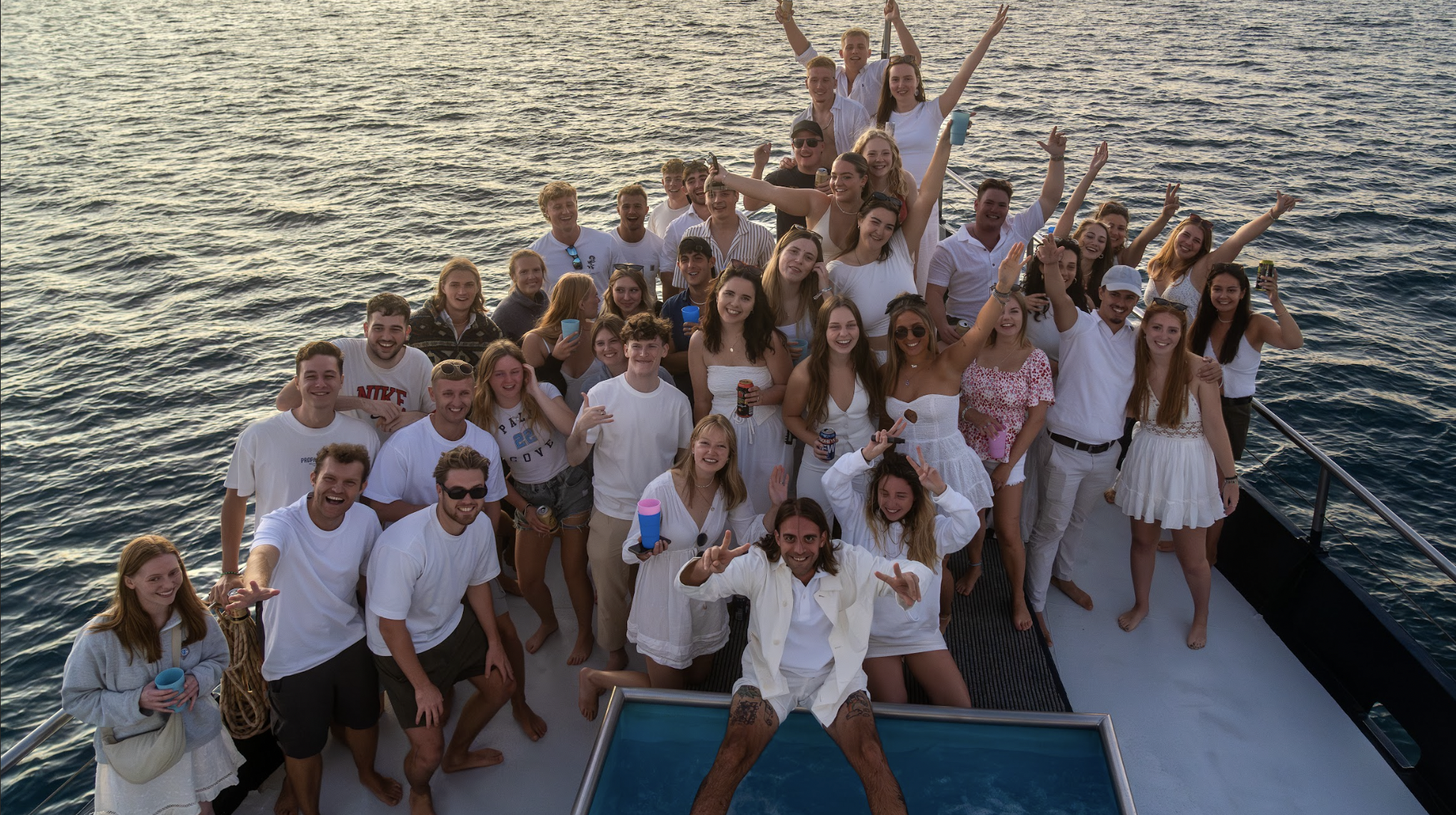 A group of solo travellers making friends on the Atlantic Clipper sailing boat